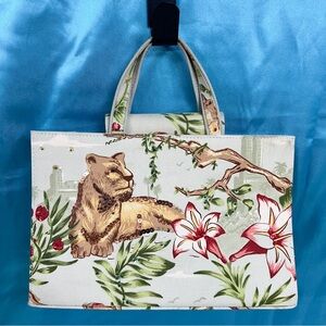 Mint green “Queen of the jungle” lion handbag